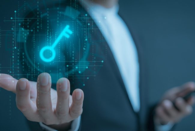 Key,Unlock,Business,Man,Holding,And,Managed,His,Cybersecurity,And